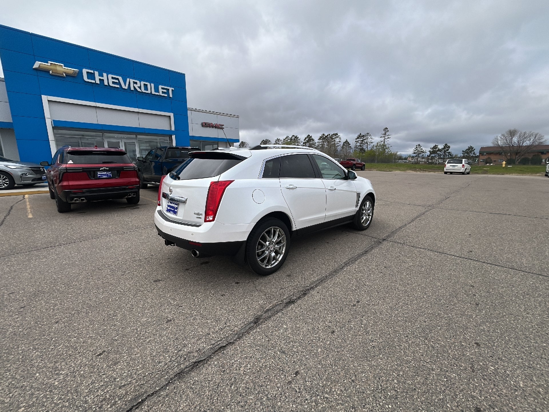 Used 2013 Cadillac SRX Premium Collection with VIN 3GYFNJE38DS550558 for sale in Bemidji, Minnesota